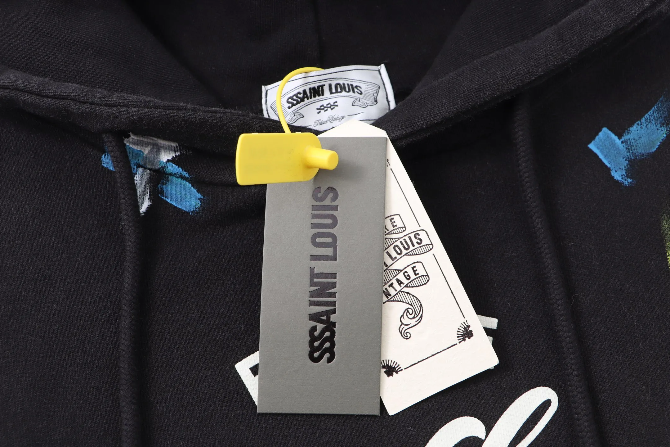 Style No. S115 P💰300 (450g version) SSSAINT LOUIS retro washed college style fluorescent ink splash hoodie. Washed black, made of 450g dense cotton fabric. Washing process, loose fit. Same style for men and women. Size: S-XL.